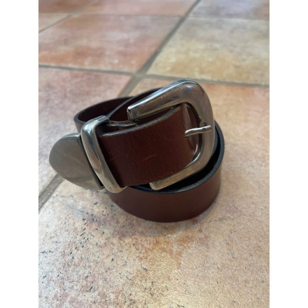 Leather belt size, large brown, with a silver buckle